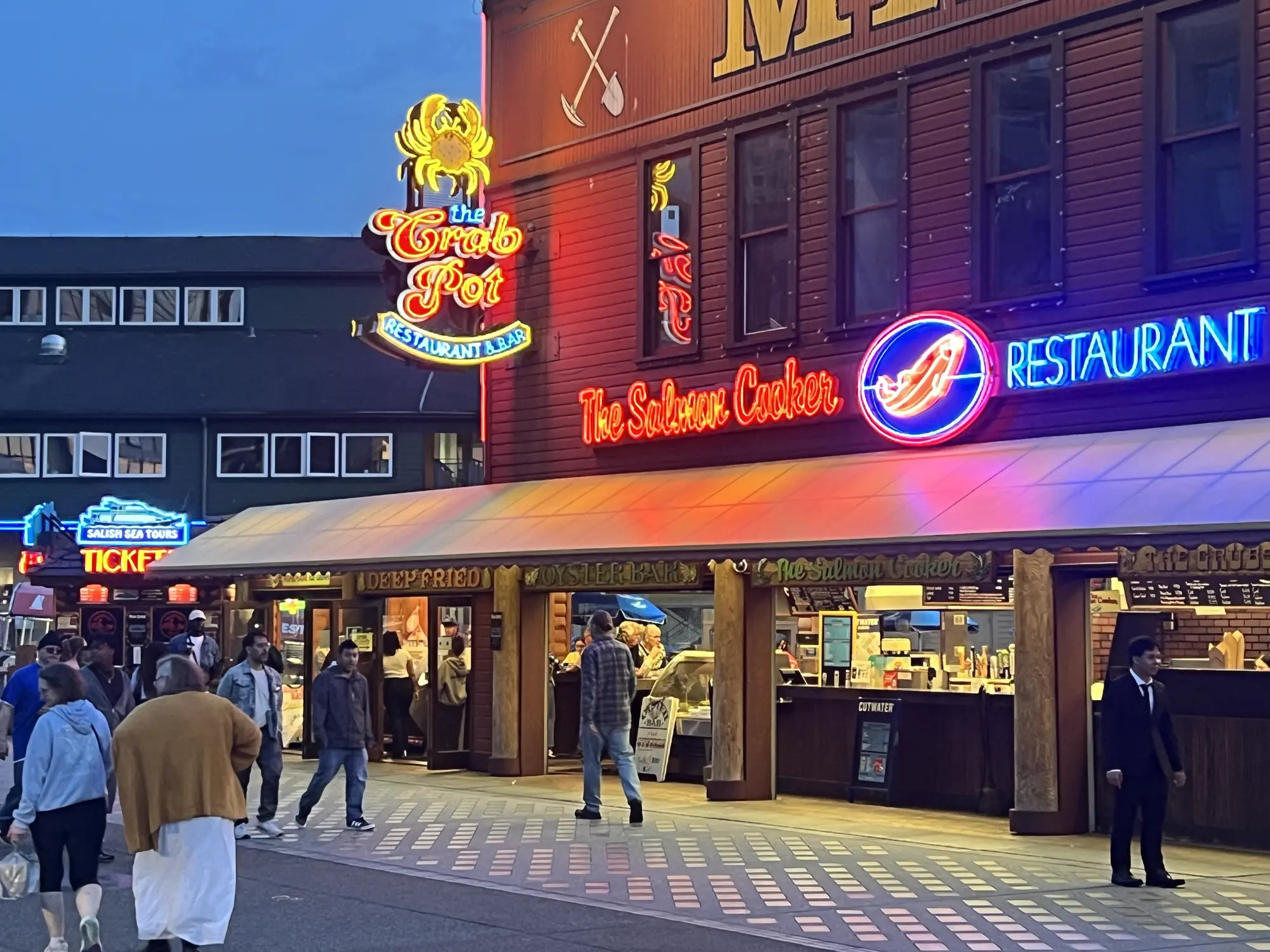 The Crab Pot Seattle — buckets of seafood and wooden mallets, the loud waterfront experience