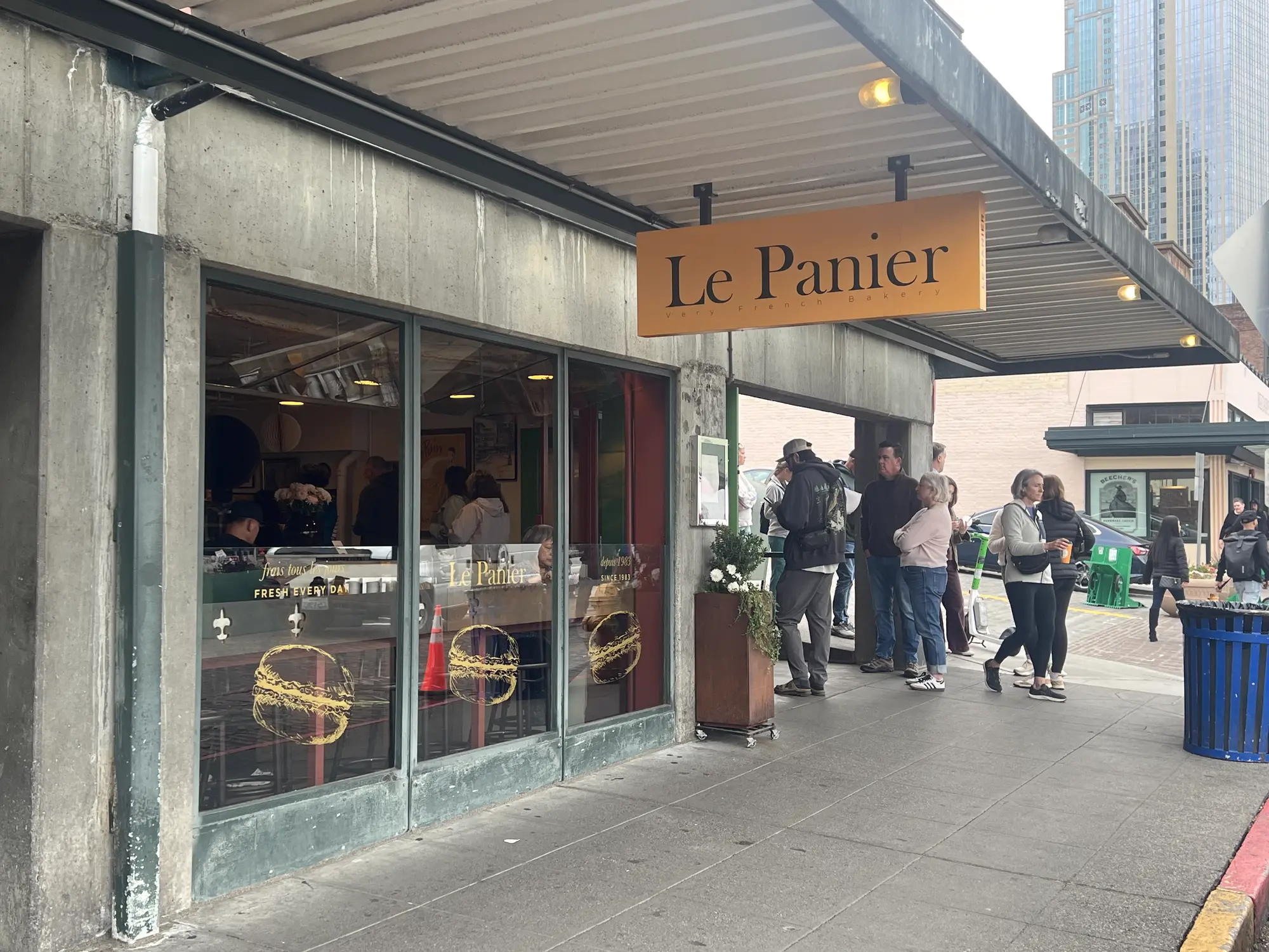 Le Panier — French bakery storefront on Pike Place with the typical line out front