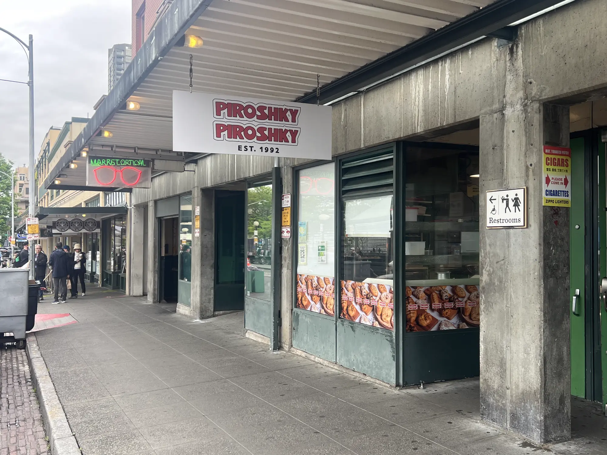 Piroshky Piroshky — tiny Pike Place storefront with the line curling down the sidewalk
